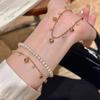 Elegant French Retro Heart Tassel Diamond Pendant Bracelet - High-End Fashion for Women.