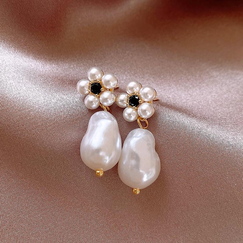 

Серьги-пусеты Серебряная игла , Маленький ароматный ветер , Цветок , Жемчуг , Легкая роскошь, Темперамент знаменитости, Ретро, Элегантные, Высококлассные