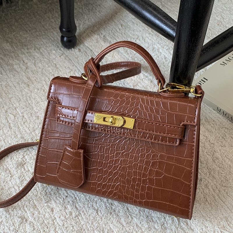 Korean version of fashionable niche stone pattern bag 2025 autumn new texture handbag retro fashion messenger bag bag