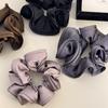 A Simple and Elegant French Retro High-end Black Ear-trimmed Flower Bud Satin Large Intestine Hair Tie