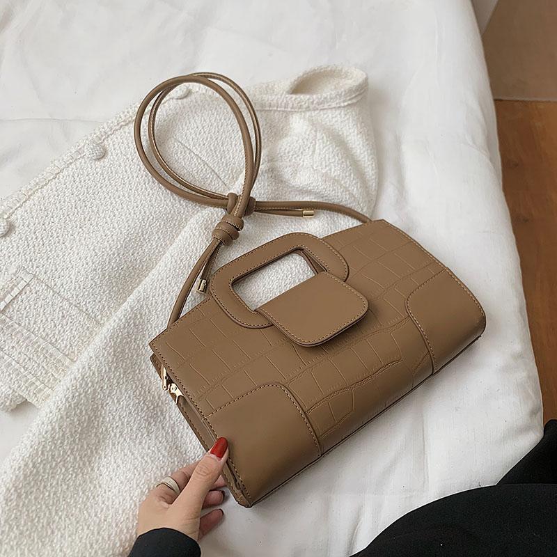 Elegante tekstur damevesker allsidige skulder-crossbody-vesker feminine jobb- og crossbody-pendel-vesker monokrome og retro nye