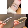 Luxury Gold And Silver Oval Hand Chain With Gemstone Detailing For Daily Fashion