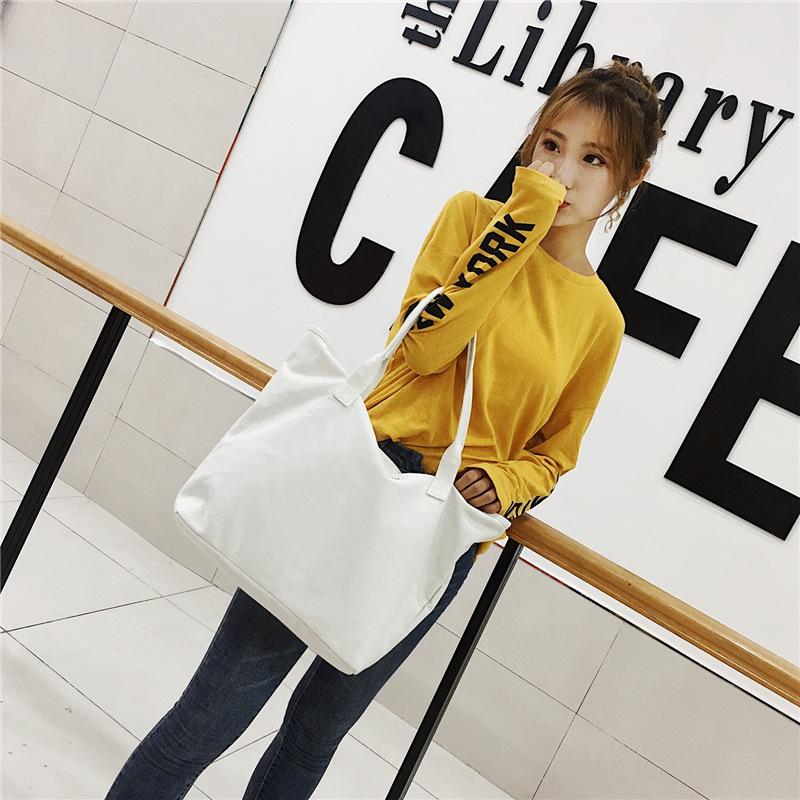 Fashion shoulder portable canvas bag zipper travel fitness bag large capacity small fresh and trendy