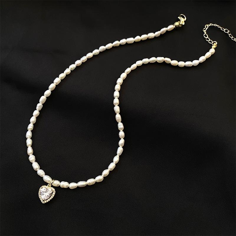 

Cold Style Freshwater Pearl Necklace with Diamond Heart Pendant
