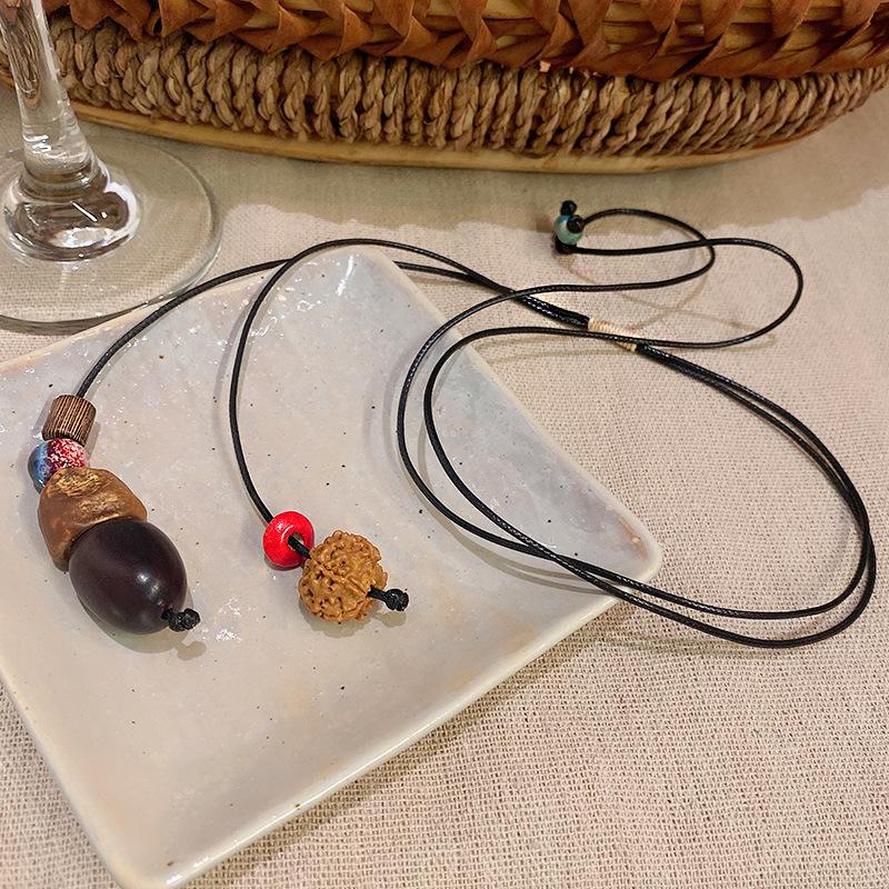 Autumn and winter retro pine nut woven necklace women's retro ethnic style fashion long sweater chain design sense