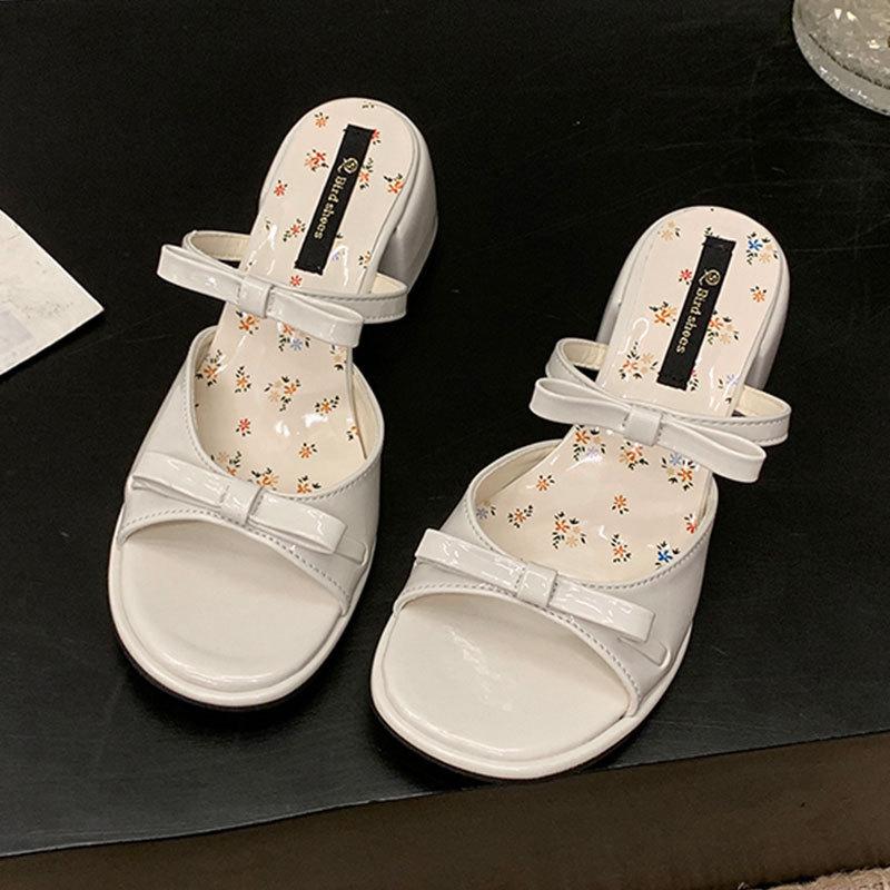 One-word sandals women's models 2025 summer new thick heels with skirts French bows and high-heeled cool slippers
