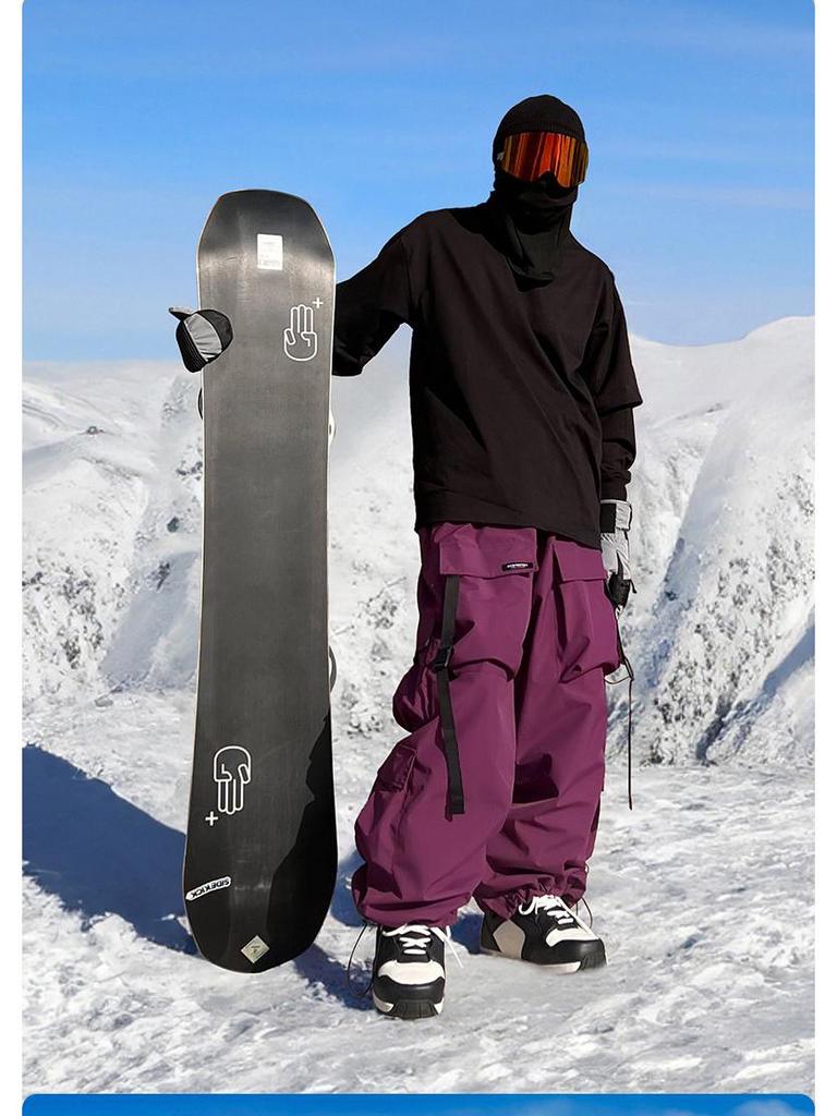 Wodoodporny kombinezon narciarski Xuexiang z wieloma kieszeniami - Grube, ciepłe spodnie śnieżne dla mężczyzn i kobiet