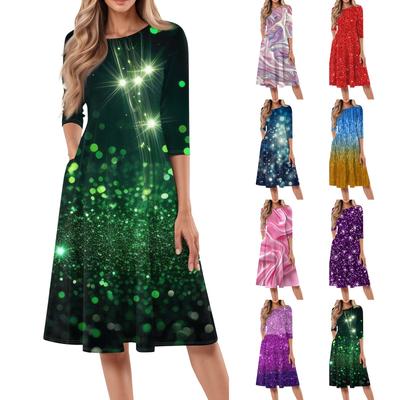 Damska, swobodna i modna sukienka z okrągłym dekoltem i rękawami typu siedem czwartych, średniej długości, z nadrukiem