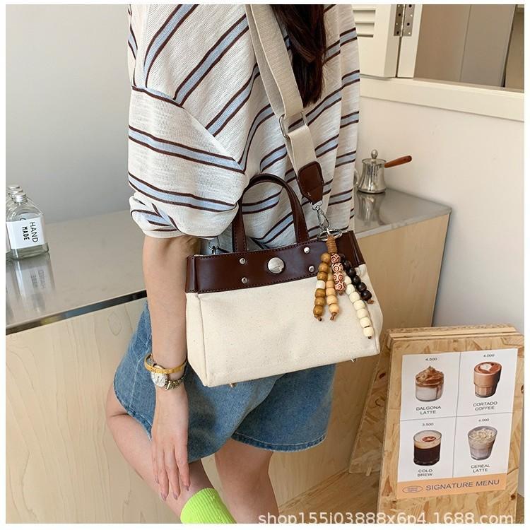 New niche design simple fashion canvas large capacity commuting wind tote bag casual texture hand