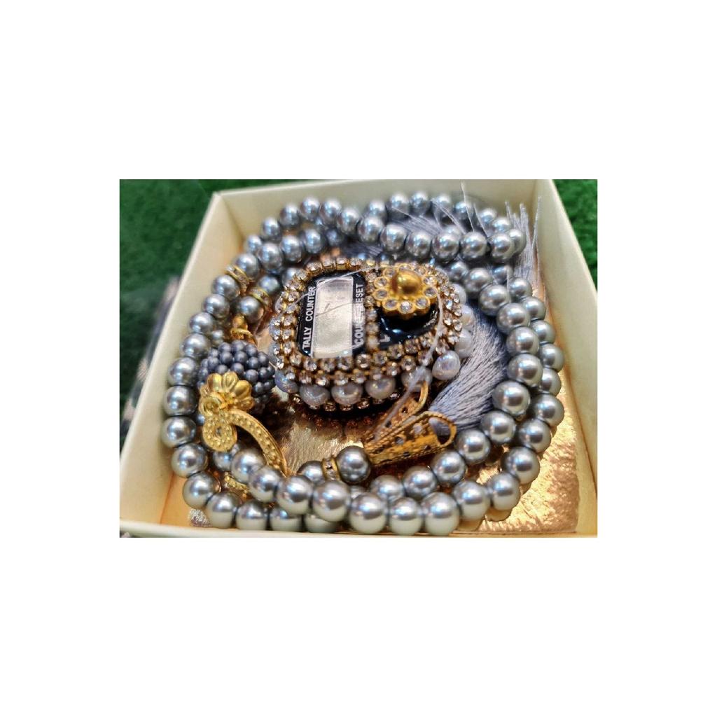 Geschenkset mit Steingesängen und Gebetsperlen im Karton