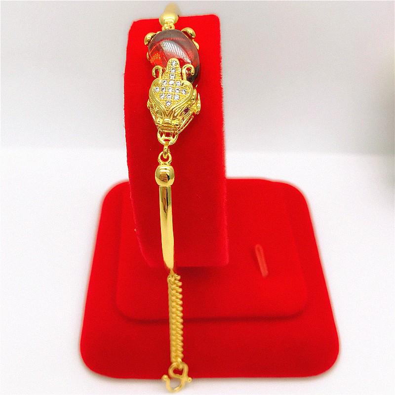 Vietnamese Gold-Plated Brass Jewelry Set with Red Corundum Gemstone: Pixiu Ring, Bracelet, and Necklace.