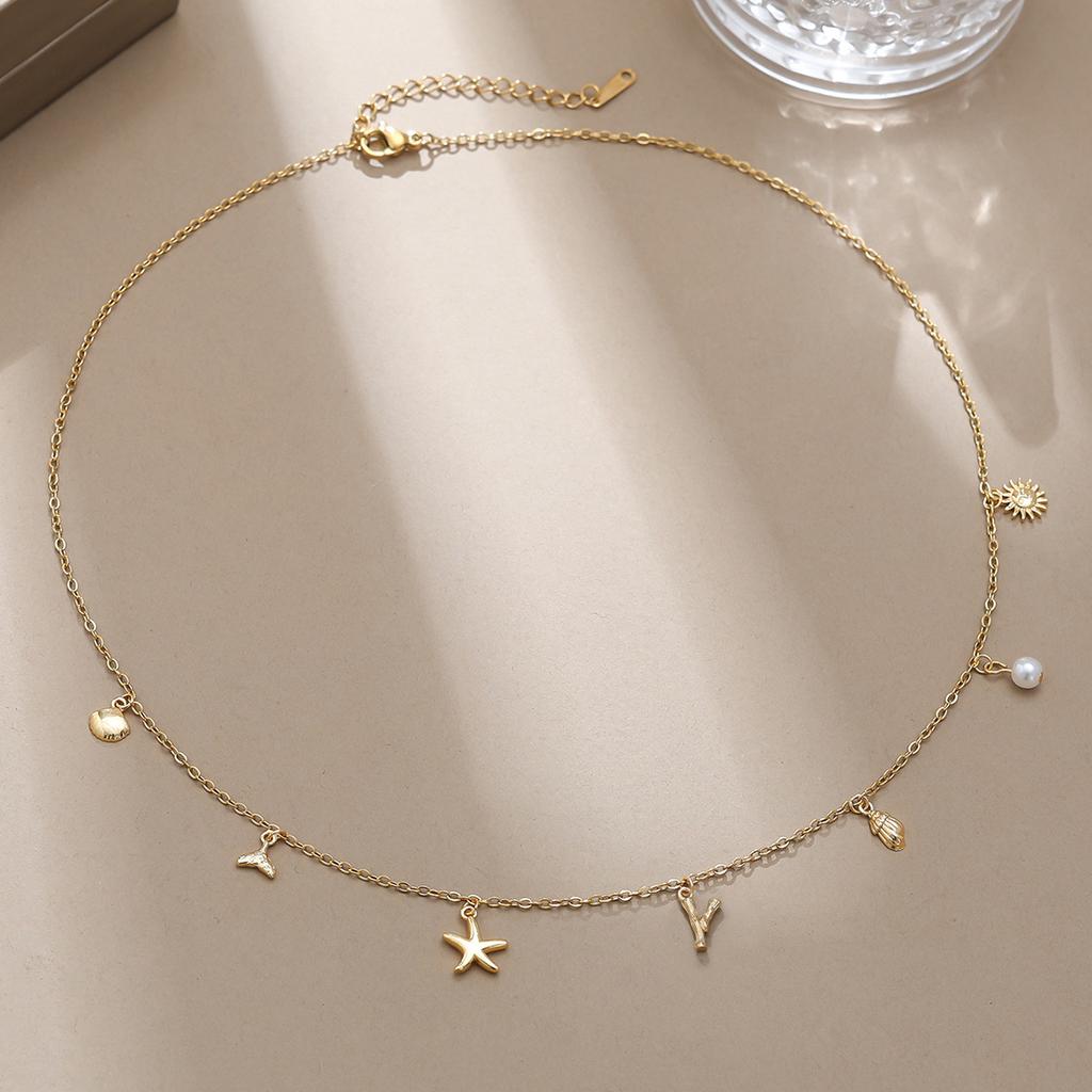 Einfache und modische Goldbuchstaben-Serie Meereskreaturen-Dekorationskette