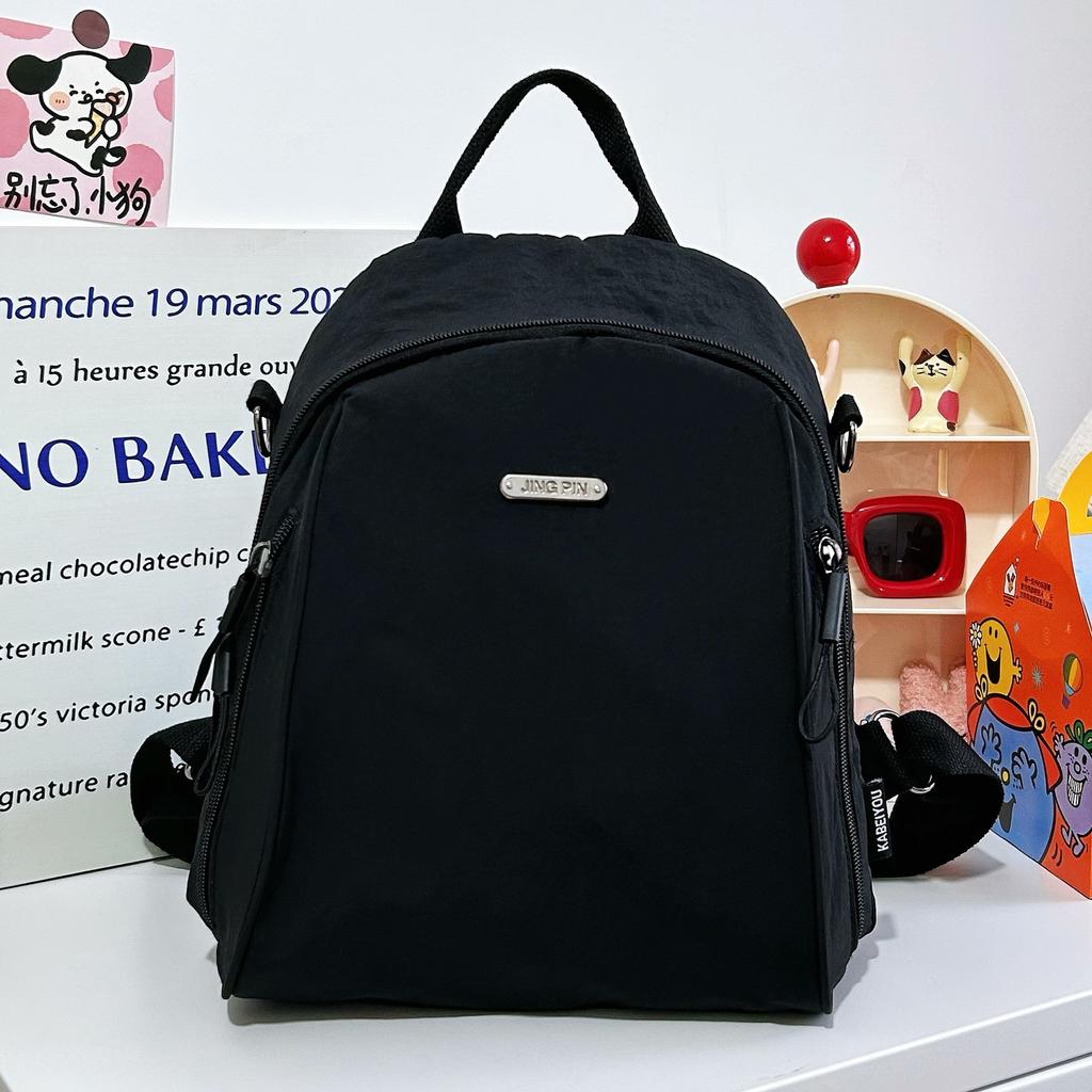 Versatile solid color women's backpack large-capacity leisure bag simple backpack light schoolbag light luxury student bag commuter bag