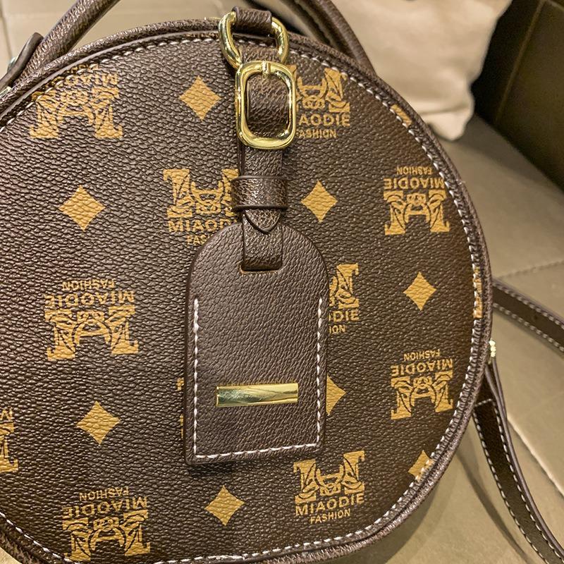 Bag women's new versatile messenger bag fashionable texture shoulder bag portable small round bag