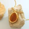 European and American exaggerated water drop-shaped large pendant inlaid with natural tiger's eye stone necklace texture Hepburn style temperament