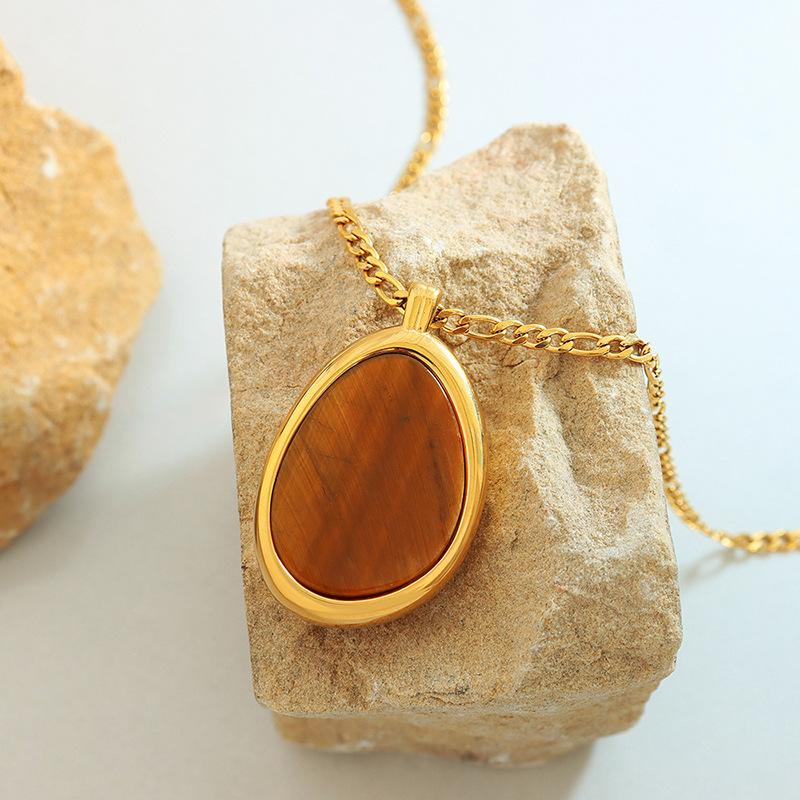 European and American exaggerated water drop-shaped large pendant inlaid with natural tiger's eye stone necklace texture Hepburn style temperament