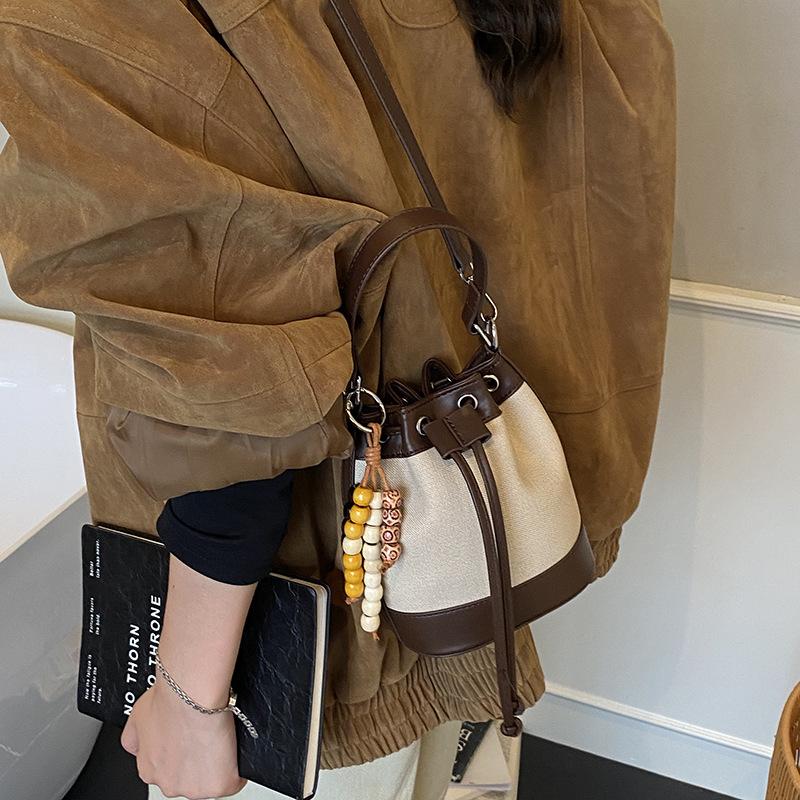 

Premium handbag bag women s 2025 new autumn and winter shoulder versatile messenger bag Korean version drawstring hand carrying bucket bag no pendant