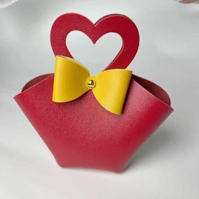 10 pezzi distribuiscono sacchetti regalo in pelle rosa, bomboniere per ospiti, mini borsetta con nastro, scatola per imballaggio di caramelle, decorazioni per feste