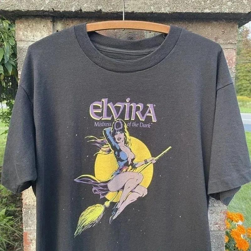

Classic 1990s Elvira Mistress of The Darkness Black Unisex and Women Tshirt Reprint Casual Shortsleeved Shirts for Unisex Women 4XL