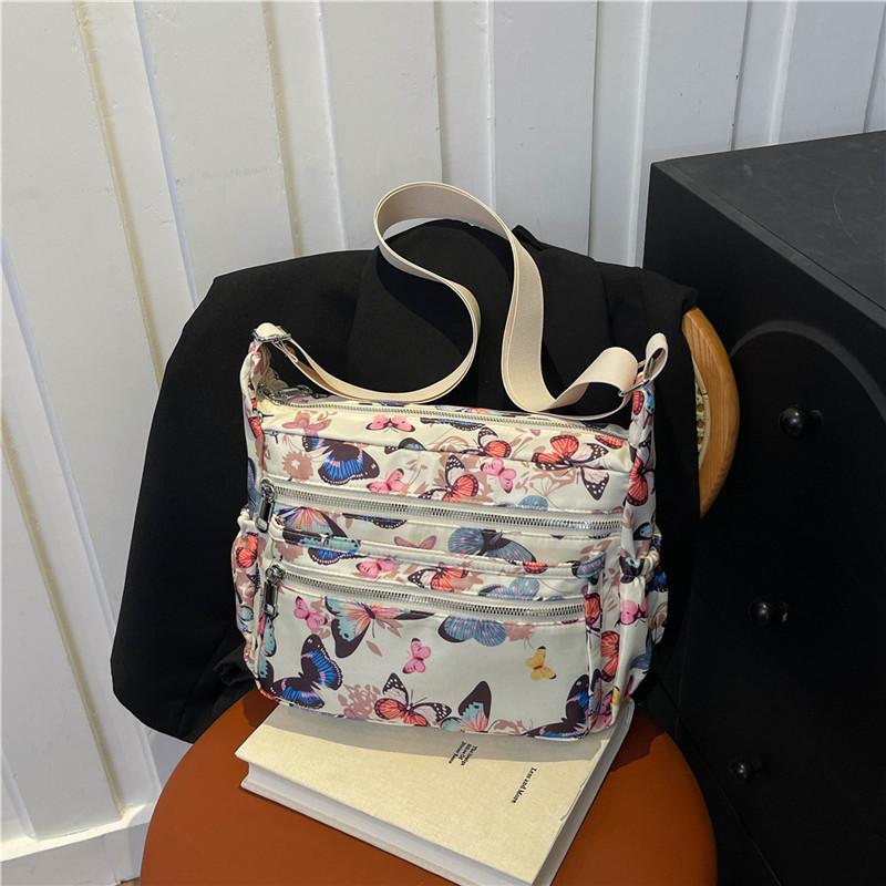 

Niche design Oxford cloth bag women s new casual versatile printed shoulder bag lightweight messenger bag