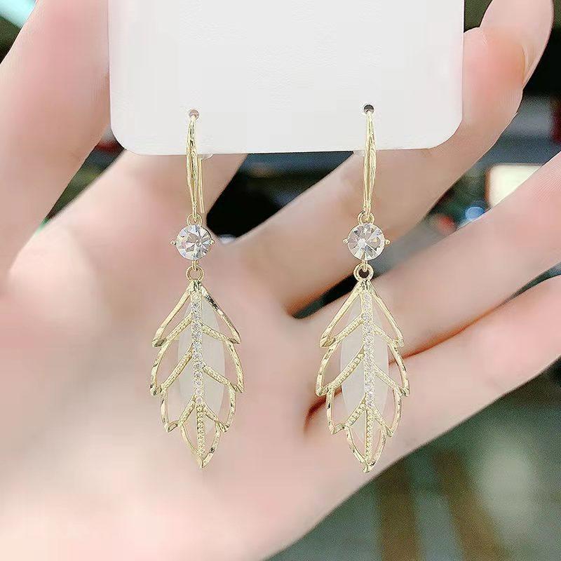 Fashion Geometric Bow Flower Pearl Earrings Women'S Premium Versatile Small Fragrant Wind Earrings