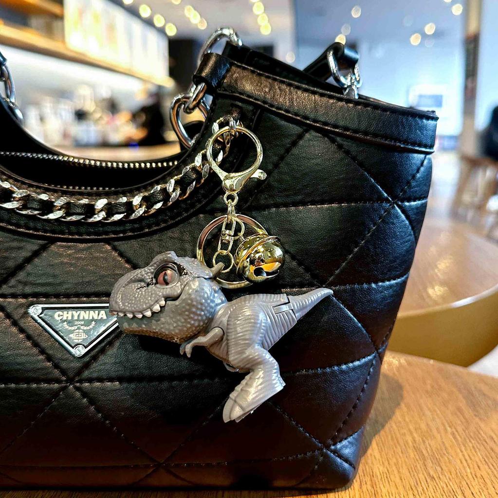 Trendy PVC Cartoon T-Rex Keychain Pendant with Dinosaur Bell and Hand-Biting Feature
