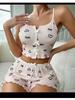 Pigiama a coste alla moda con stampa di ciglia a forma di cuore per donna