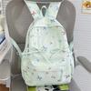 Cute Bow Tie Print School Backpack Lightweight Nylon Zipper Daypack with Front Pocket for Teen Girls Daily Travel