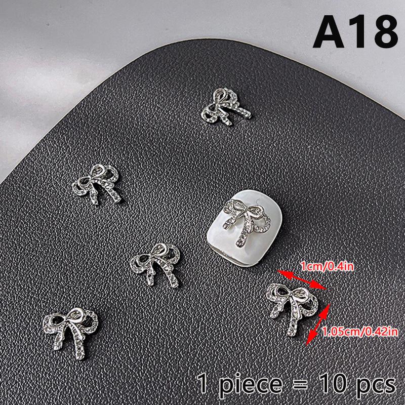 10 ks Jednoduché Tenké Mašličky Stříbrné Kroucené Slitiny Ozdoby na Nehty Manicura Přívěsky