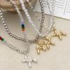 Chic Balloon Dog Pendant Necklace: Fashionable Animal Pearl Bead Chain for Women’s Versatile Clavicle Jewelry