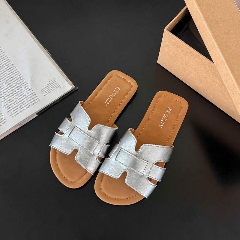 2025 new super hot one-word slippers women's summer wear fashion versatile skirt flat-bottomed beach cool slippers