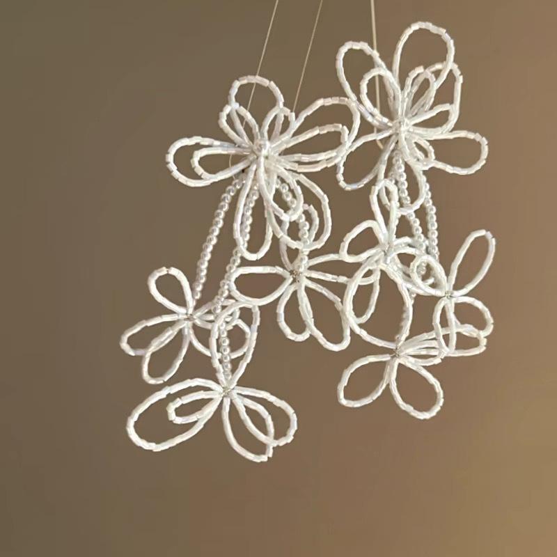 

Срібні сережки-підвіски з китицями у вигляді квітів з перлів та діамантів - Розкішна модна заява