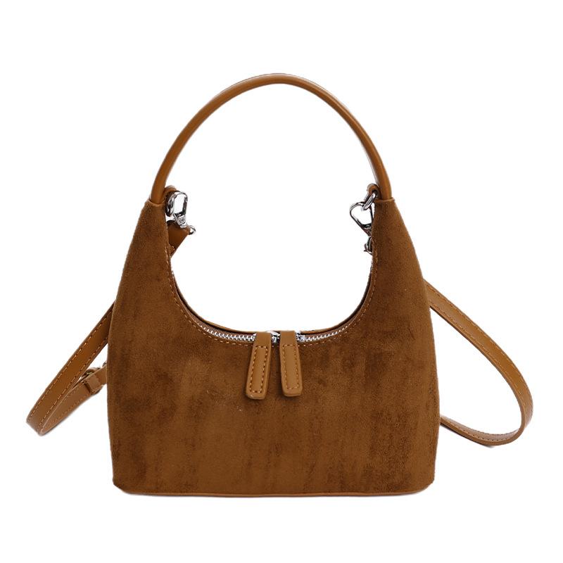 Retro fashion dumpling bag women 2025 new bag high sense light luxury niche commuting single shoulder cross hand bag