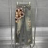 Europäische Station Frühling Neue Persönlichkeit Spice Girl Chiffon Dreidimensionale Blume Ripped Wash Water Weite Beine Jeans Damen Trend