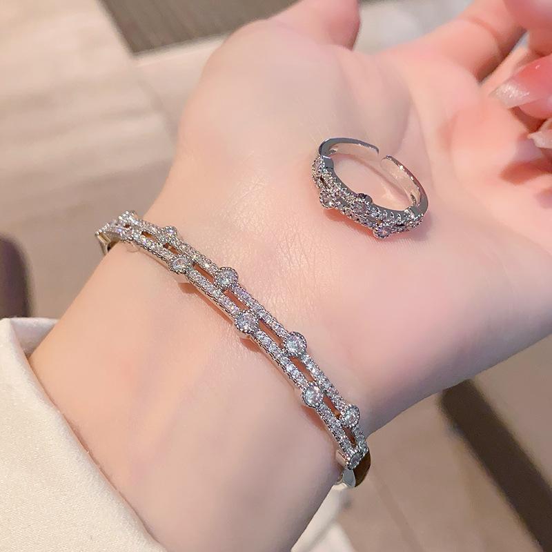 

Super flash temperament zircon bracelet women s double-layer pearl zircon bracelet ring set срібний
