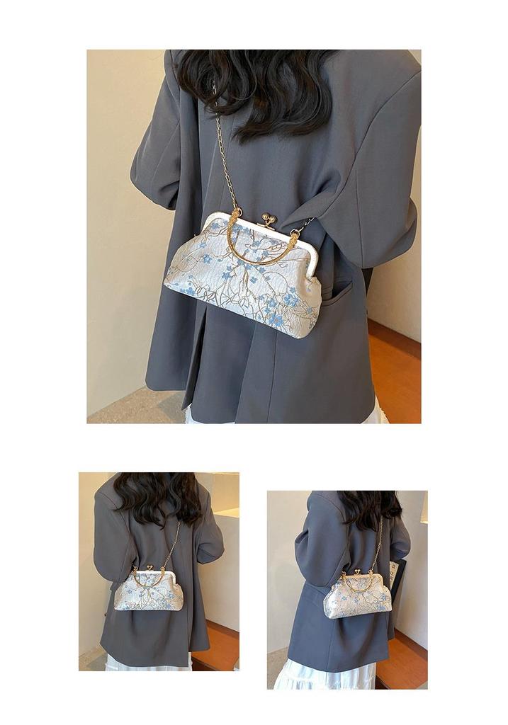 Elegante bestickte Umhängetasche mit Kettenverschluss
