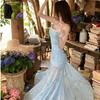 French blue floral suspender dress women's summer seaside vacation beautiful slim pure desire fishtail hip wrap dress