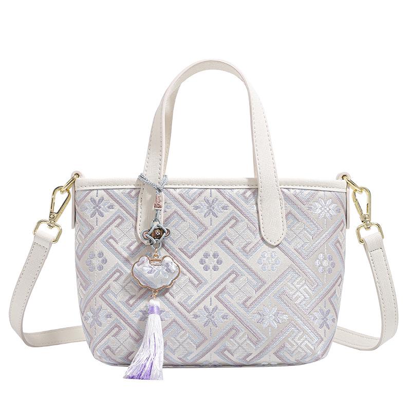 Guangxi Zhuang Brocade Women's Versatile Bag - 2026 High-End, Simple Design, Handheld, Shoulder, Crossbody.