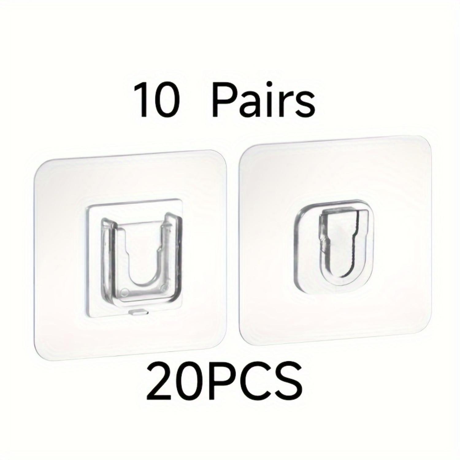 

Двусторонние самоклеящиеся настенные крючки бесшовные и невидимые, используются для подвешивания тяжелых предметов в ванных комнатах и кухнях. 10pc