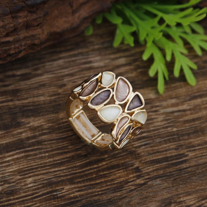 New enamel color hollow geometric petal elastic ring women's simple high-end versatile flower ring