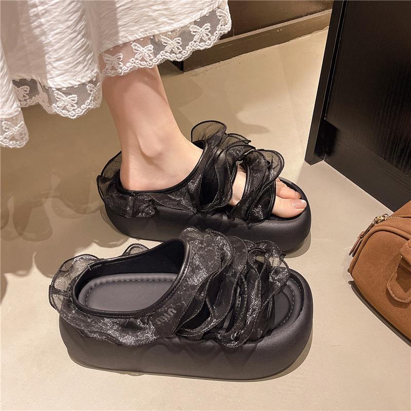 2025 Frühling und Sommer neue Produkte coole Hausschuhe Feenwind große Blumen dicke Sohle Höhe Ein-Wort-Schlepper tragen Mode-Hausschuhe