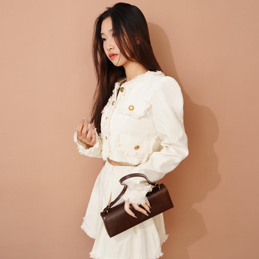 Cowhide underarm shoulder bag women's 2025 new high-end first layer oil wax drop pattern soft small square bag baguette bag