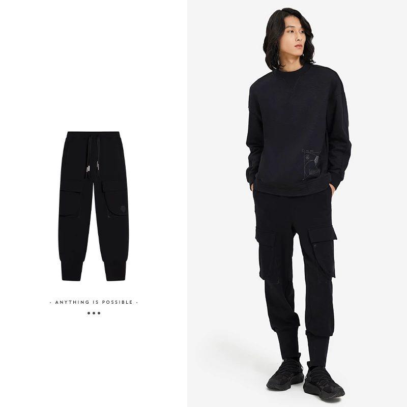 Li Ning Li Ning X Jackie Chan Stickade Sweatpants Herr Ecru AKLSC21-2