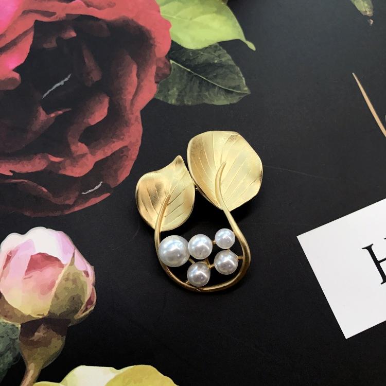 Fashion temperament dumb gold brooch corsage women's suit jacket sweater coat pin crystal high-end accessories