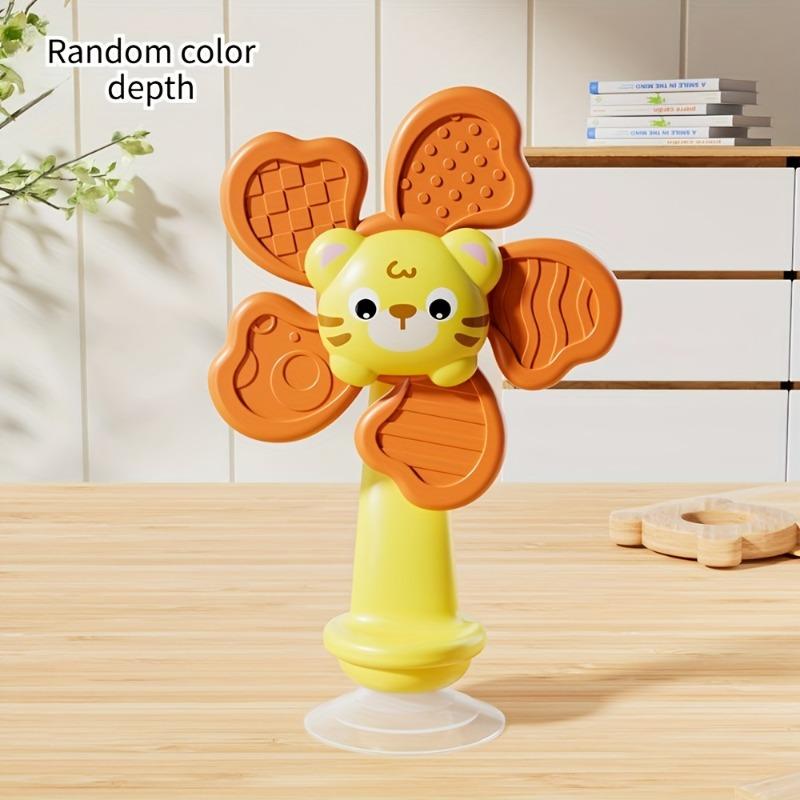 Baby Suction Cup Spinner, ABS sensory toy, portable for travel, helps develop motor and cognitive skills.