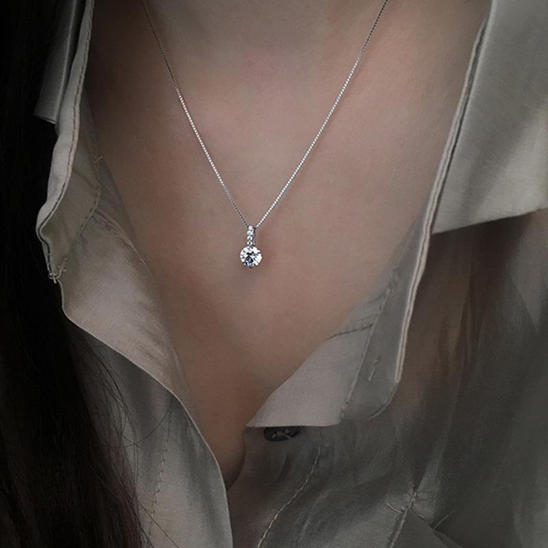 Geometric Light Luxury Water Drop Necklace: Simple Single Diamond Pendant for Women