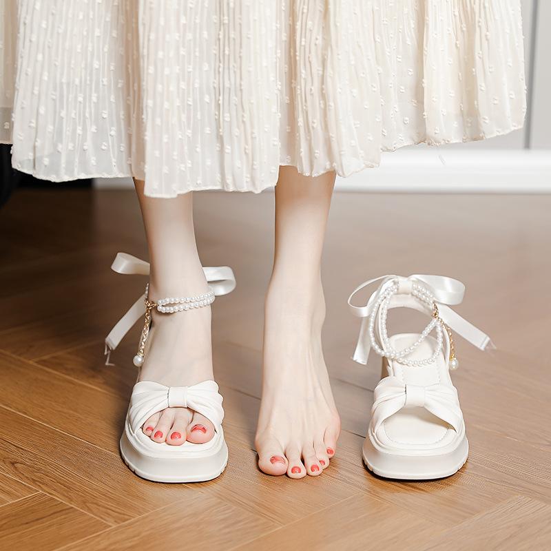 Summer is not tired of gentle feet fairy wind pearl bow thick heel platform sandals women's sense of stepping on shit increases Roman shoes