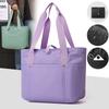 Women's portable folding storage bag with multiple compartments and adjustable shoulder strap for large capacity.