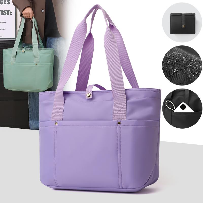 Women's portable folding storage bag with multiple compartments and adjustable shoulder strap for large capacity.