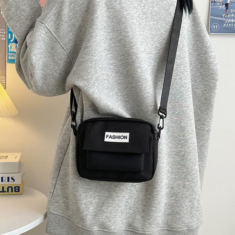 Nylon cloth messenger bag college student leisure sports small backpack single shoulder travel street Internet celebrity wide shoulder strap small